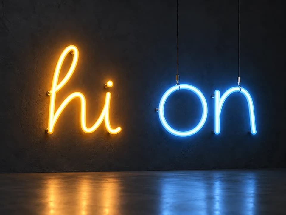 Design comparison of medium-weight amber 180-degree faux neon hi lettering and suspended ice-blue 360-degree faux neon on lettering