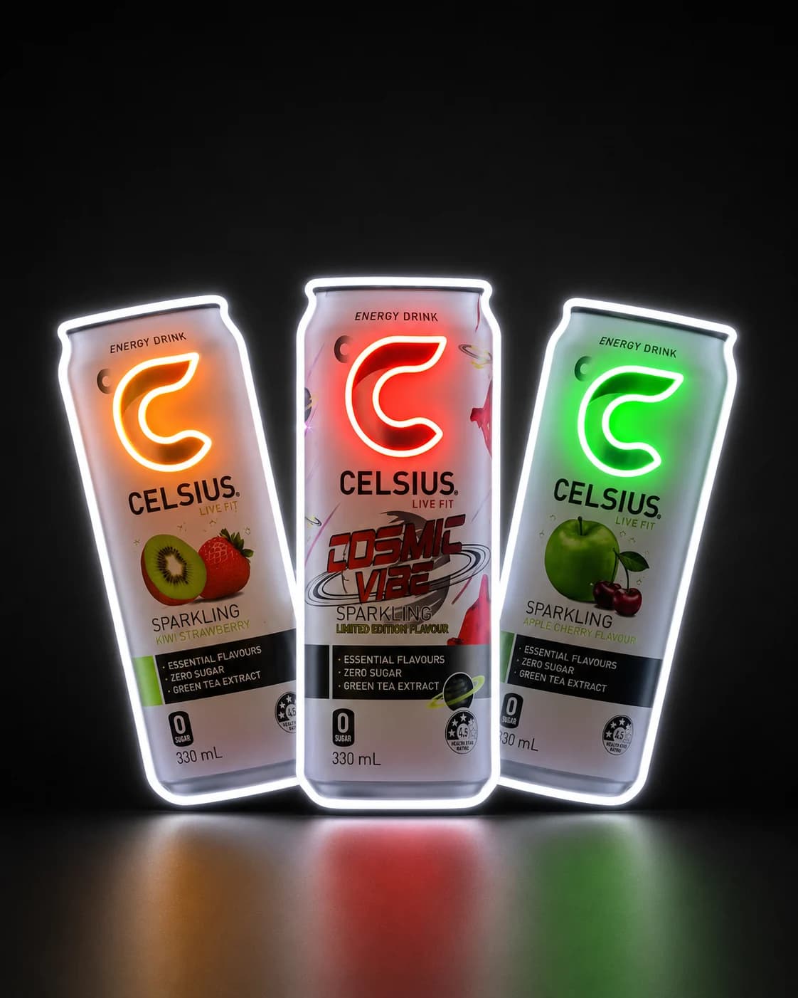 Three illuminated CELSIUS drink-can signs in orange, red, and green